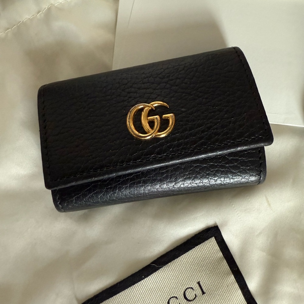 Gucci Black Wallet with Gold Emblem